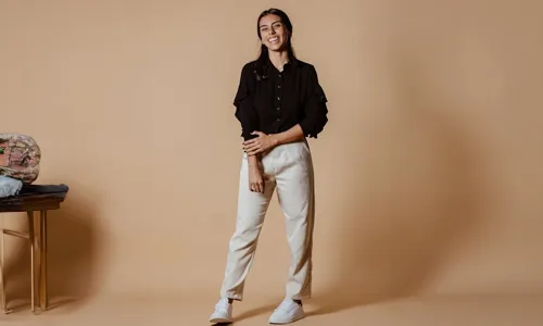 Girl-in-black-shirt-and-white-sneakers