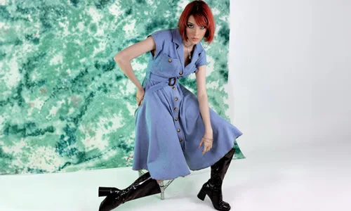 Women-in-red-hair-blue-dress-and-black-boots
