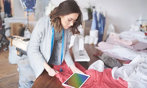 Girl with specs with tape around her neck