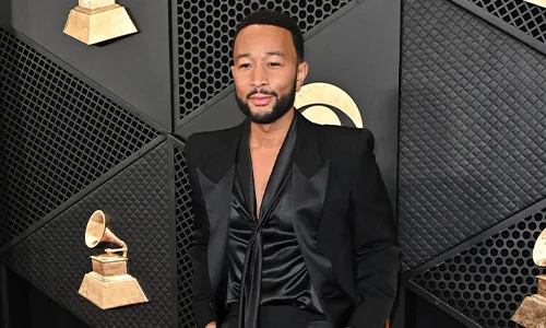 Man in full black suit