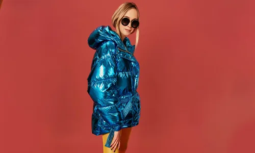 Woman-wearing-shiny-blue-jacket