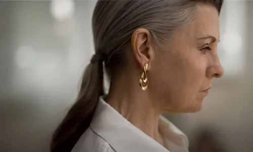 Close up shot of Gold earring