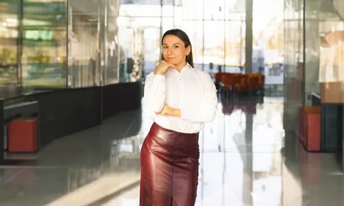 Women wearing white shirt and brown skirt