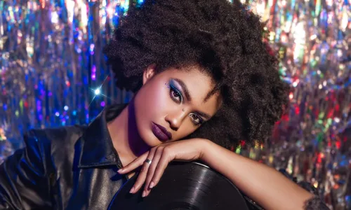 woman wit CD in hand