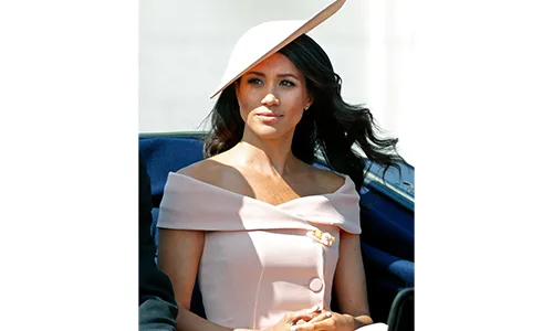 Meghan Markle in pink dress and hat