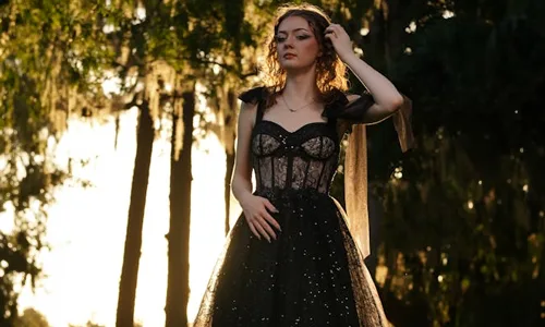 Woman in black corset dress